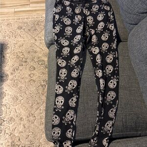 Torrid Black Leggings with Skull Design